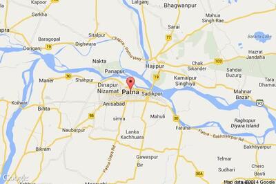 Police arrest two officials on corruption charges