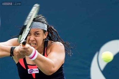 Wimbledon champion Bartoli out of Rogers Cup due to injury