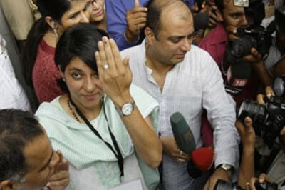 Phase III: Maya, Ambani among early voters