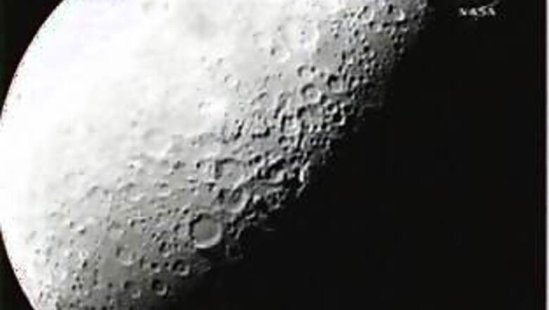 NASA photos show moon strike created plume