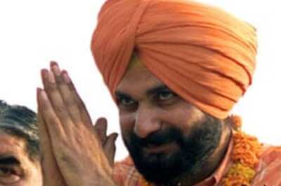 A candlelight welcome for Sidhu