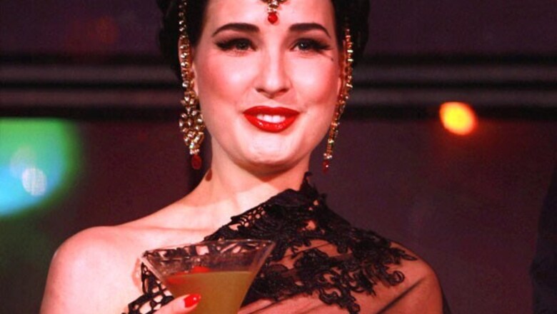 Burlesque dancer Dita Von Teese learns to drape a saree