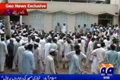 Lal Masjid tense after angry students attack media