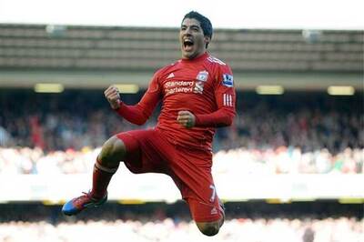 Suarez, Downing fire Liverpool into FA Cup semis