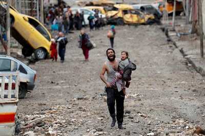 Iraqis Protest to Defy 'Slaughter' in Baghdad as Drone Hits Cleric's Home Killing 20