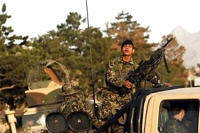 Afghan Taliban attack hotel, police free 18