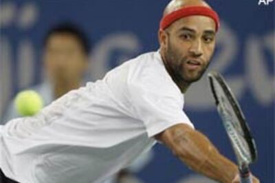 Top seed Federer knocked out by Blake