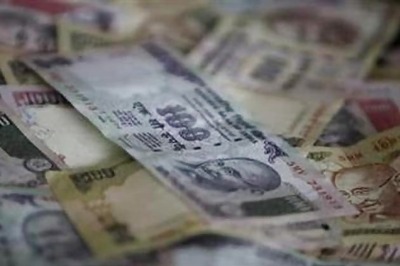 Rupee up 17 paise against dollar in early trade