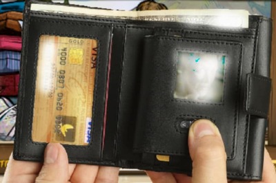 Seeing Mom's Photo, Pickpocket Ships Wallet Back to Owner. Sans Money