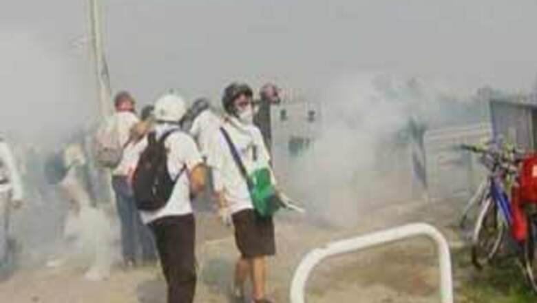 Police, protesters clash ahead of G8 meet in Italy