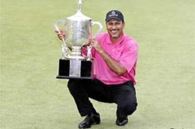 Jeev pips golfing greats to lift Singapore Open