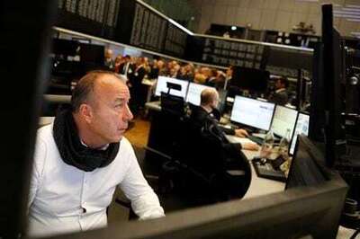 Stocks rally on new U.S. highs, dollar at 2-year low