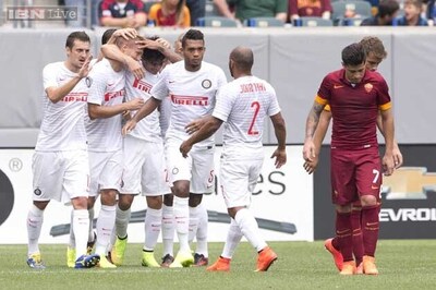 Nemanja Vidic, Yuto Nagatomo score as Inter Milan beat AS Roma 2-0