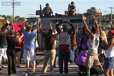 Ferguson video shows witness raising hands in air