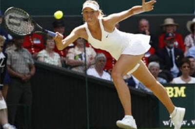 Wimbledon: Sharapova ousted, Federer strolls on