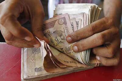 Rupee closes at 62.31, down 15 paise
