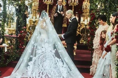 Kourtney Kardashian and Travis Barker Slammed for 'Mocking' Catholicism With Their Wedding Attire