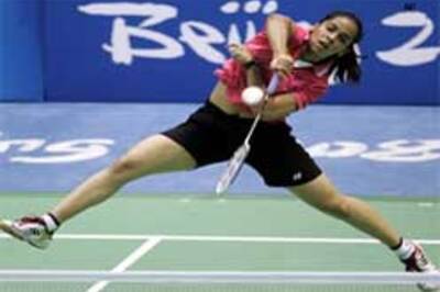 Saina stuns 4th seed Wang; one step from medal rounds