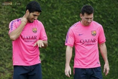 Luis Suarez happy in Messi's shadow, angry at racist label