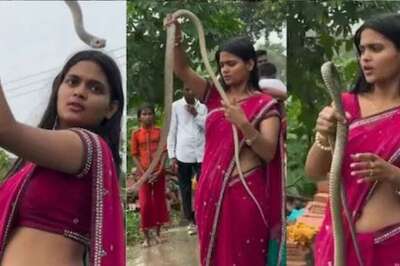 Girl in Saree Poses With Giant Snake Wrapped Around Her Body