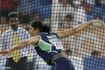 Athletics: Poonia gives India 1st gold in 52 years