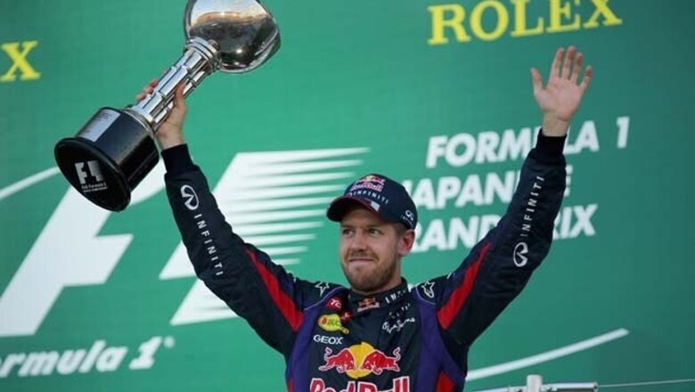 Red Bull's Vettel wins Japanese GP, title has to wait