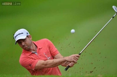 Garcia grabs lead after weather-delayed first round