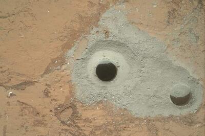 NASA's robotic rover Curiosity drills into Martian rock
