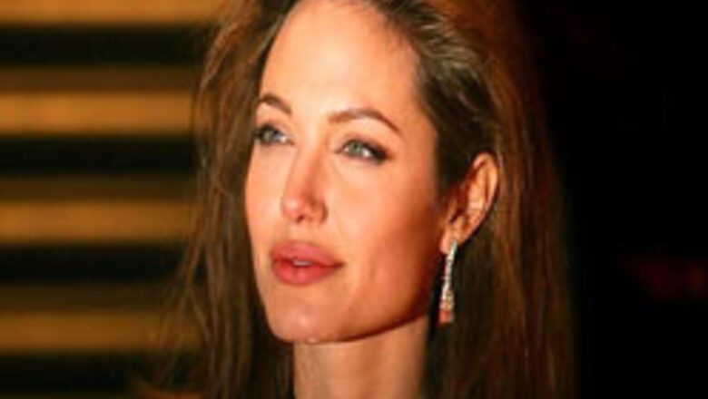 Jolie plans to adopt Vietnamese child