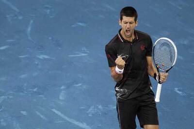 Djokovic in the groove as Serbia lead Belgium in Davis Cup