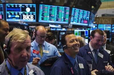 Wall Street jumps; Dow, S&P 500 close at record highs