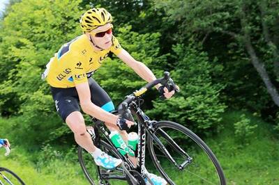 Chris Froome rides to victory in 100th Tour de France
