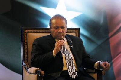 Sharif Reaches Pakistan, Promises Probe into Panama Papers Leak