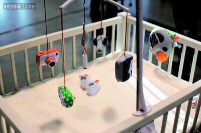 A toy that lets newborns take selfies, post them online