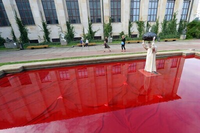 Sculpture Of John Paul II With Rock, Red Water Makes Waves