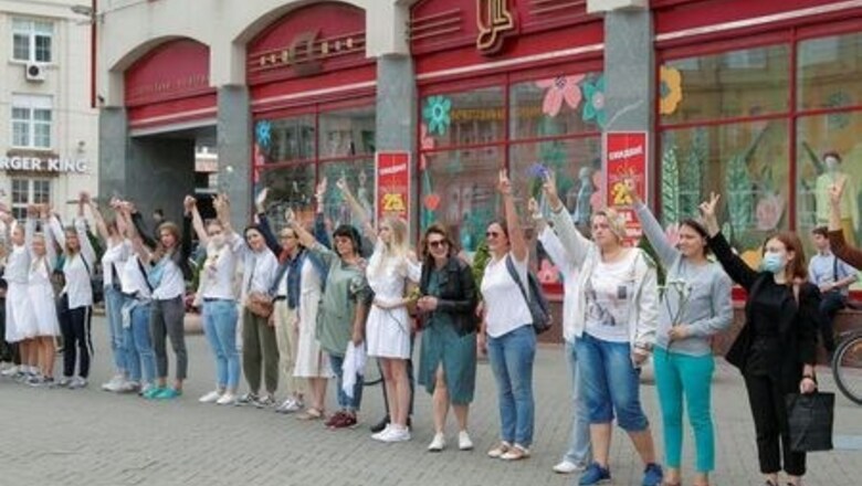 Thousands stage flower protest in Belarus as EU weighs sanctions