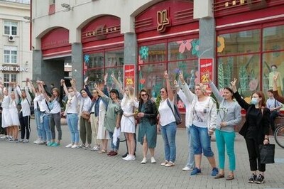 Thousands stage flower protest in Belarus as EU weighs sanctions