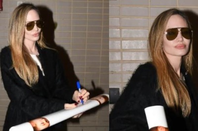 Angelina Jolie Signs Mr & Mrs Smith’s Poster Featuring Ex-Husband Brad Pitt, But With A Twist