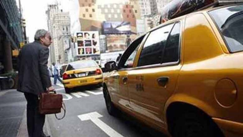 Three Britons travel round the world in a taxi