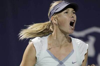 Sharapova cruises into 2nd round at Wimbledon