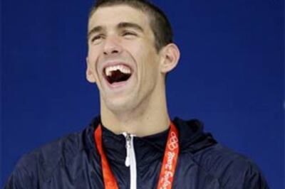 Olympian Phelps suspended, swimmer is sorry