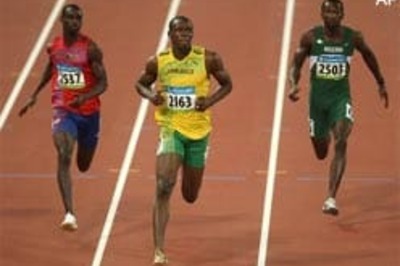 Bolt sparkles, Caribbean sprinters dominate 100m heats