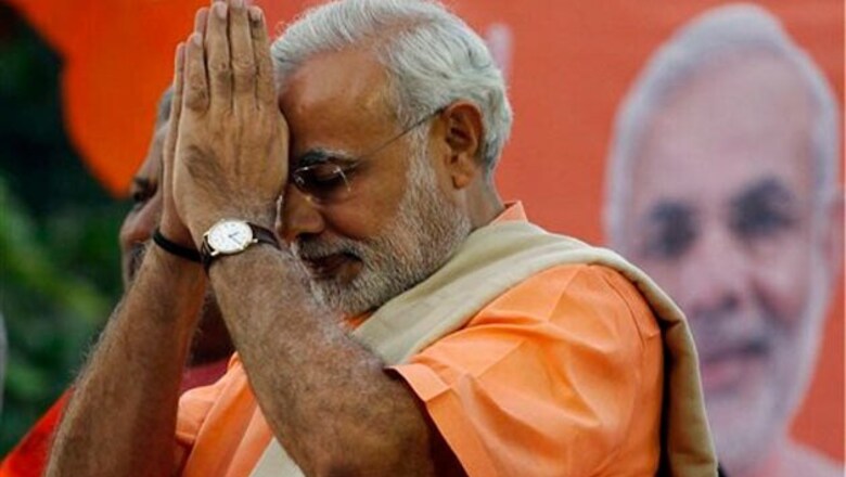RJD leader praises Modi, says he is PM material, mocks Manmohan