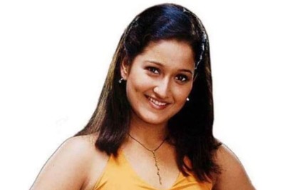 Identify This Actress From Her Childhood Photo Hint: She Won The Filmfare Award Twice In Tamil