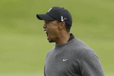 British Open: Snedeker leads, with Tiger lurking