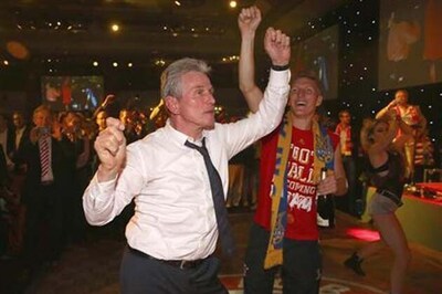 Munich parties as Dortmund mourns in divided Germany