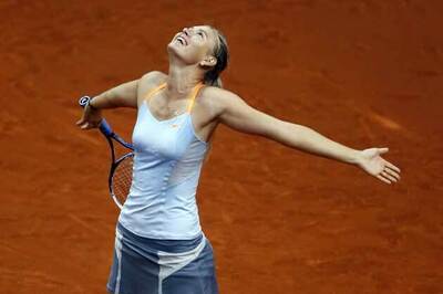 Sharapova and Azarenka advance at Madrid Open