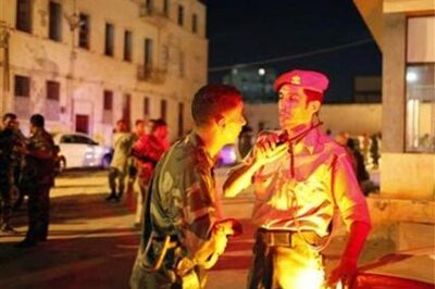 Libyan Islamist militia swept out of Benghazi bases