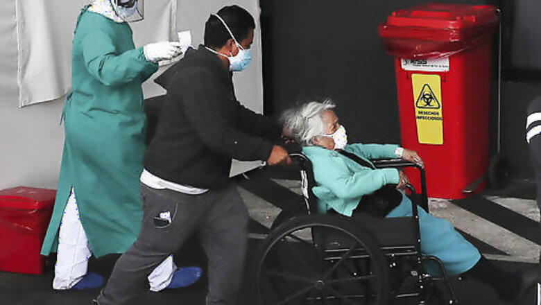 Hundreds wait hours for coronavirus care in Ecuador capital