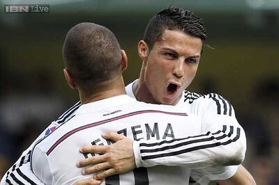 Real Madrid cut Barcelona's lead to a point, Valencia in third place